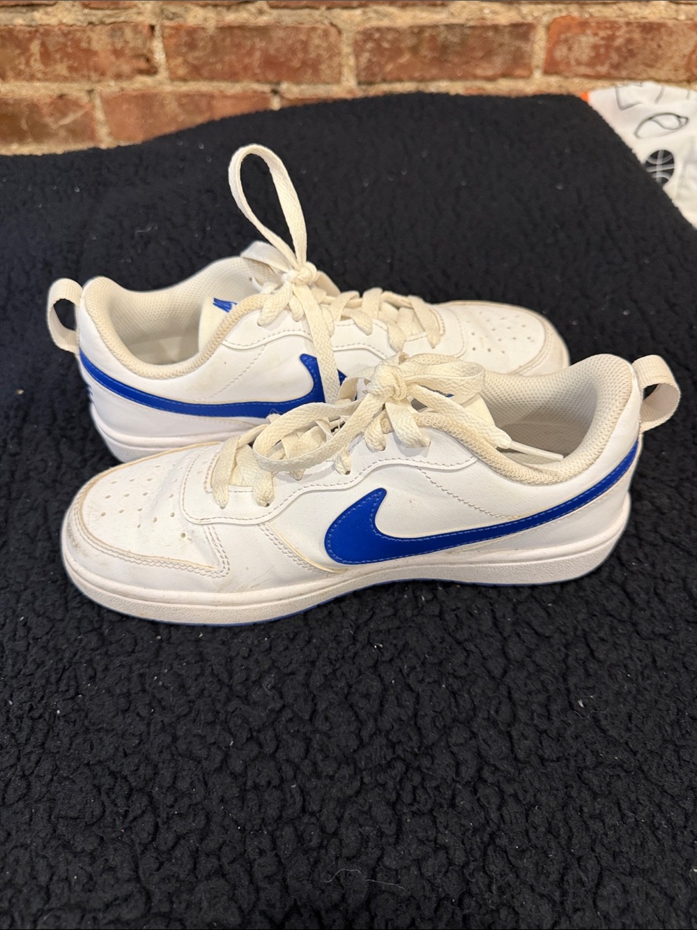 Nike Kids White Sneakers with Blue Swoosh